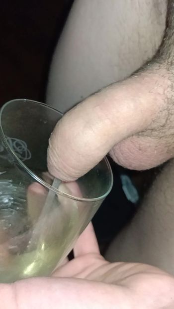 A small cock of a young gay pissing