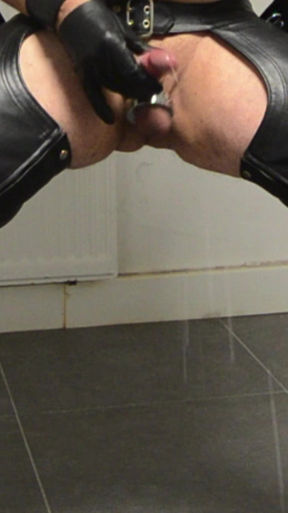 Leatherstudx in very tight leatherchaps, tattooed and pierced!