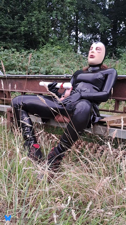 latex sissy cum outside with a vibrator