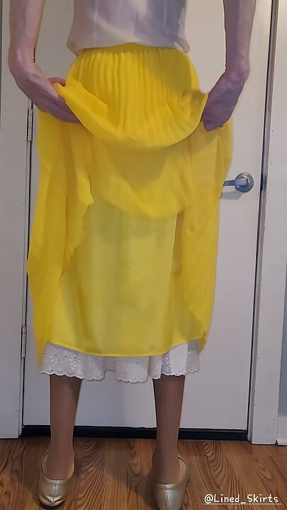 Yellow chiffon skirt with a satin half slip