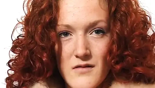 Cute redhead fingering her love hole