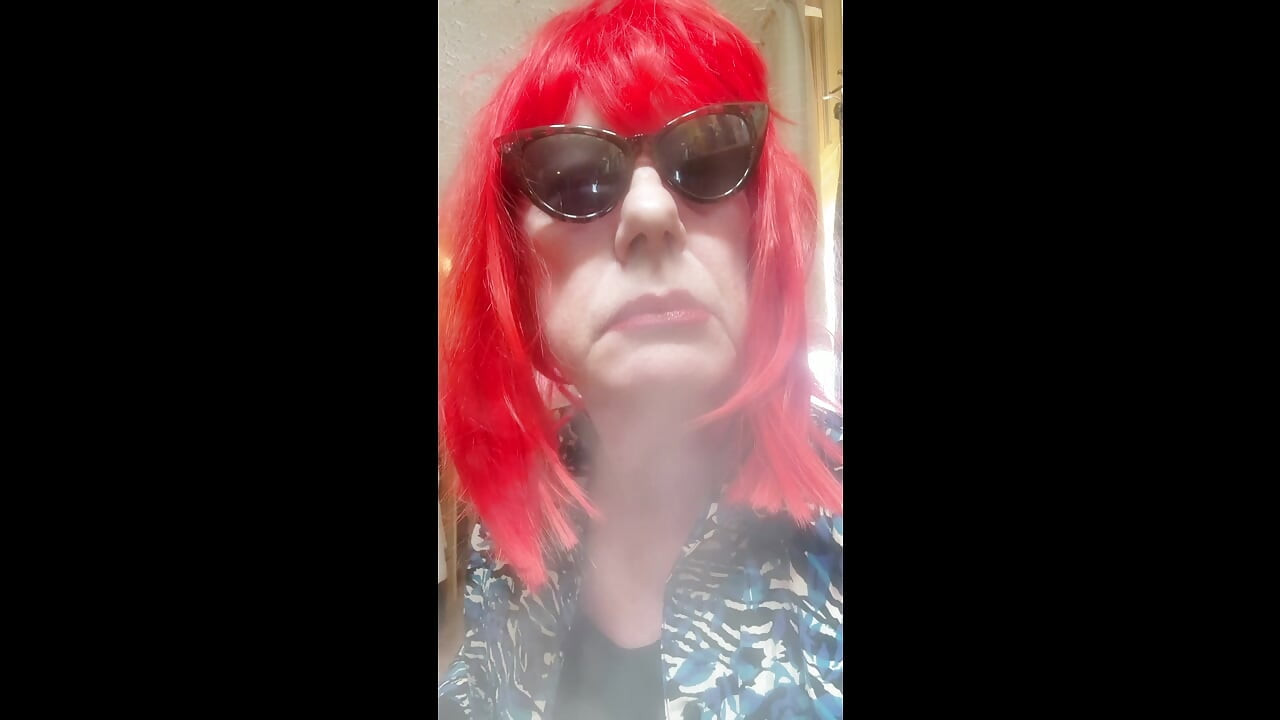 MRS. ROMAN DESTROYING A MARLBORO 100 MENTHOL CLOSE UP - WITH DANGLING AND NOSTRIL EXHALES