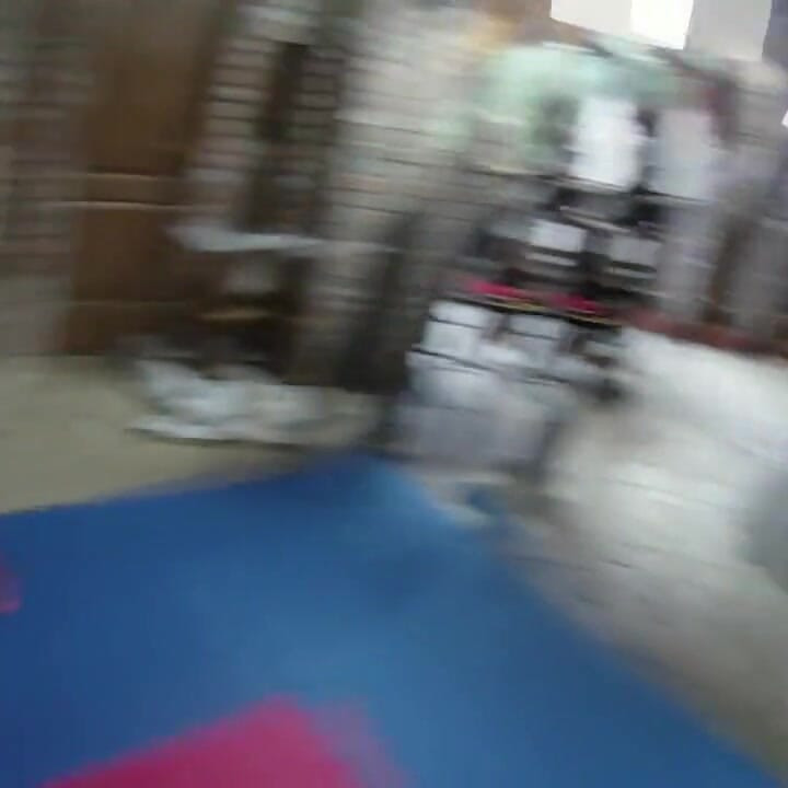 Supergirl wrestling in livingroom