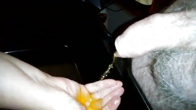 Jen is washing her hand in John's piss