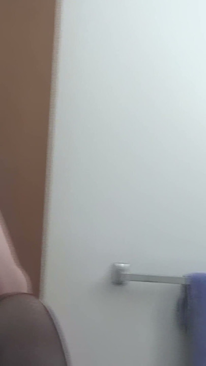 Busty Redhead in Glasses Films Herself Naked in the Bathroom Mirror