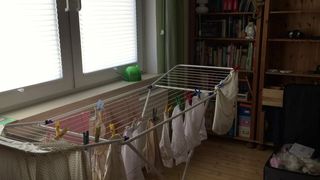CD Crossdresser Hanging up laundry in DW Lingerie