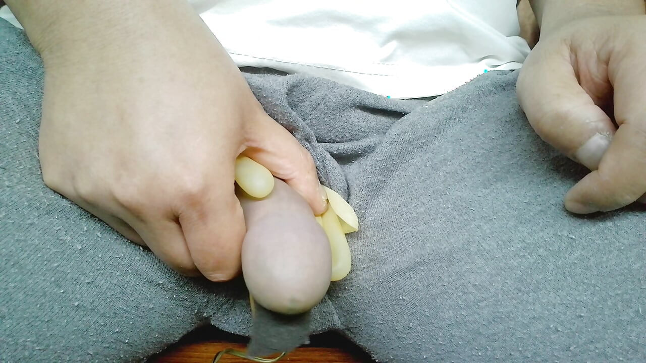 Wearing translucent latex gloves and using a vibrator to achieve multiple orgasms