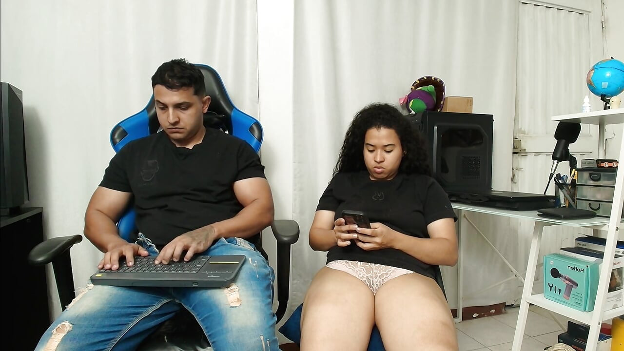 The whore masturbates in the office