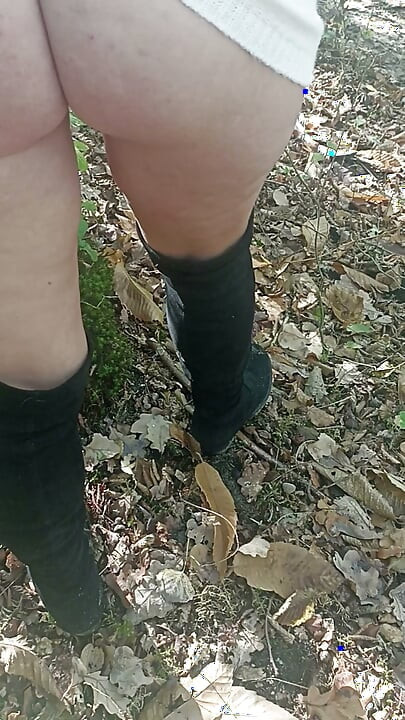Slut Jade in the wood shows off in front of voyeur