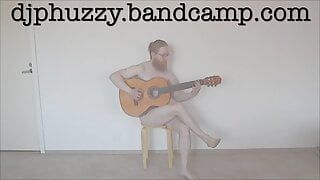 DJ Phuzzy plays guitar naked