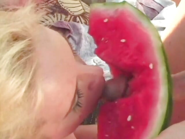 Kinky dude and blonde with huge tits get playful with a water melon then fuck outdoors