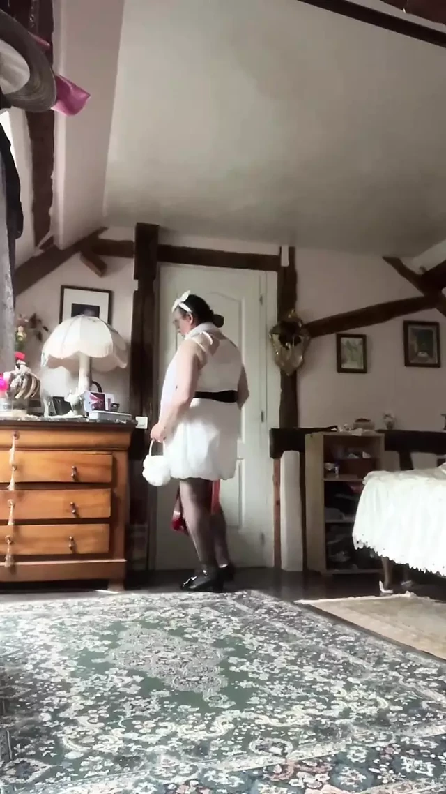 Dressed with a white ball dress for a night out