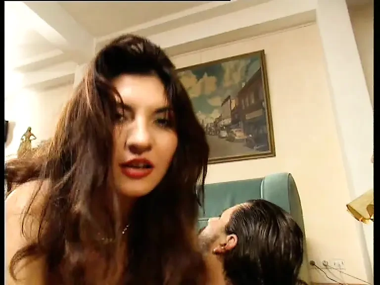 Omg! Busty Brunette in Latex Gets Fucked by Two Guys on Couch
