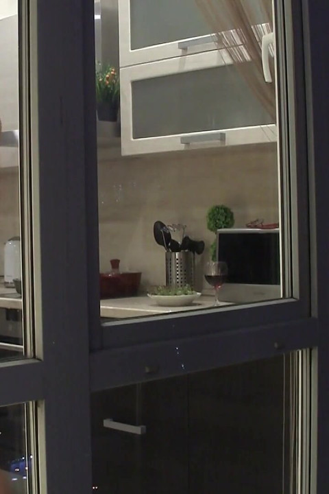 Redhead Amateur Doesn't Know That She Is Being Watched While Dancing in the Kitchen