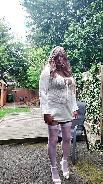 Crossdresser kellycd in white dress stockings and heels