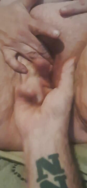 Husband fingers wife's asshole while she rubs her clit