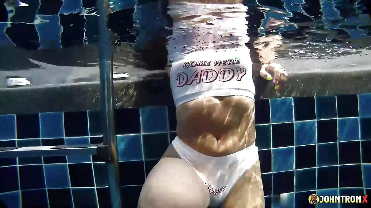 JohnTronX - Gorgeous Thai babe swims in the pool and gets that underwater D
