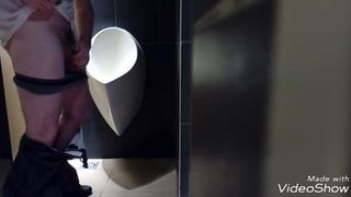 Jerking in public toilet