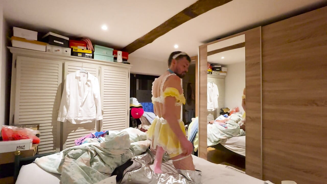 A boy in a yellow servente
