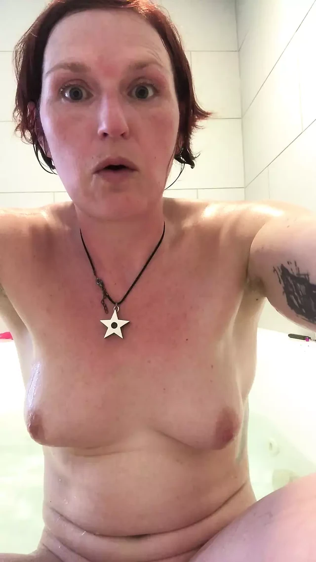 Sexy mature MILF wiggles her bum and bush in your face during a bath