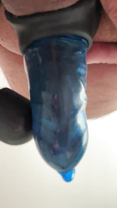 Jerking off with blue condom