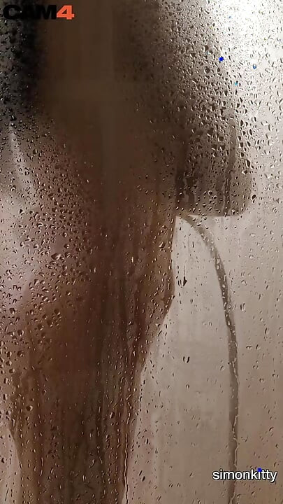 Check out this steamy shower scene with hot naked Simon