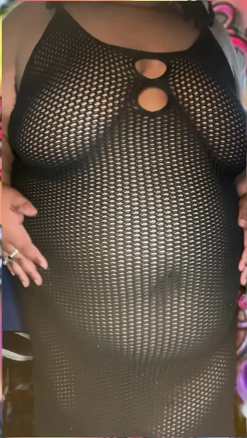 Net Dress Tease Short: Ebony SSBBW Shows off Curves in Net Dress