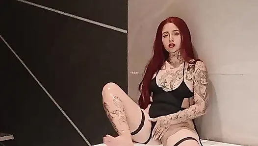 Redhead in jakuzzi alone