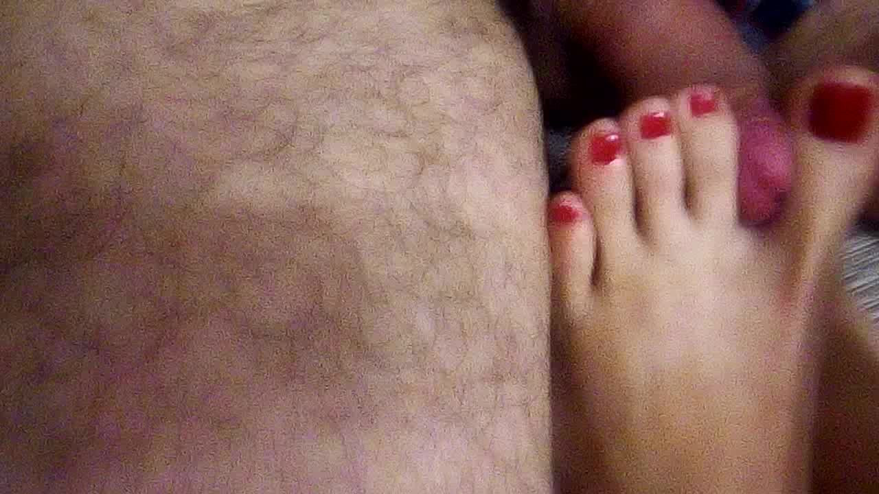 Love her giving me footjob using her's divine toes.
