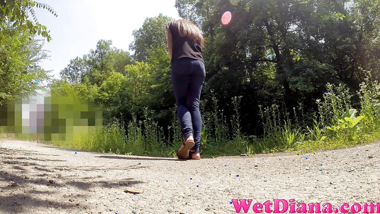 Wide open legs peeing outdoor and Desperate to pee, she has to pee in front of the car in her jeans