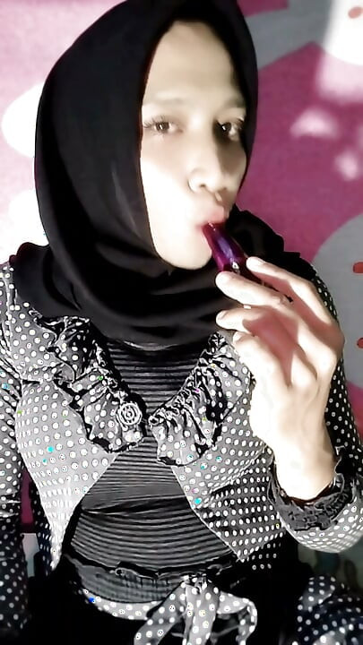 A Beautiful Hijab Is Coming Home From Her Wedding Dress