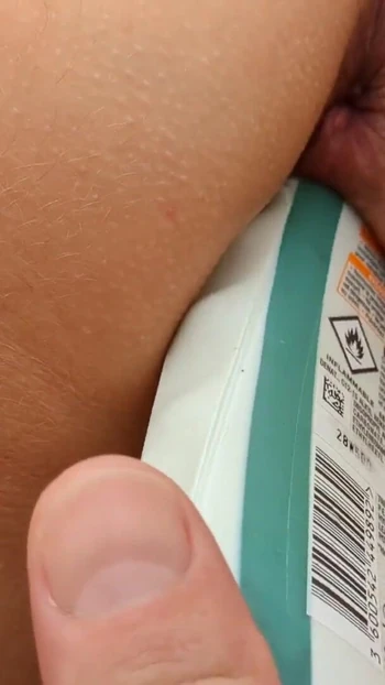 Captivating moment from "Insertion of toys hand and suncream bottle in my french milf wife's pussy whilst sunbathing outside"