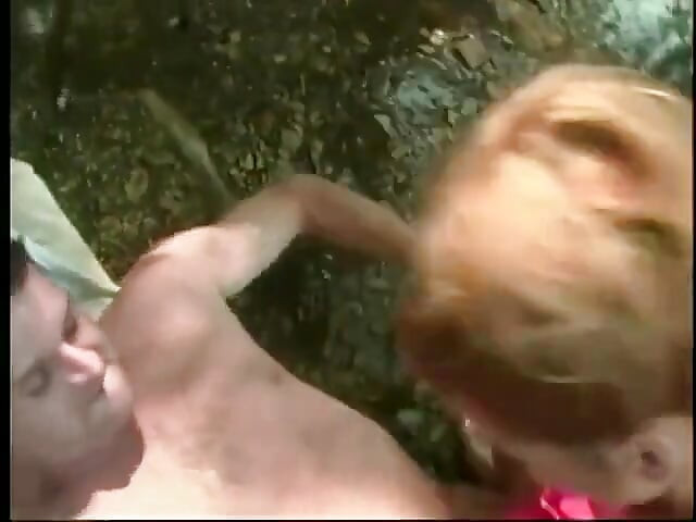 Pretty blonde babe in red nightie gets fucked outside, takes a load on her face