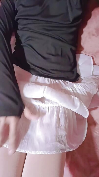 The moaning of a femboy in a dress