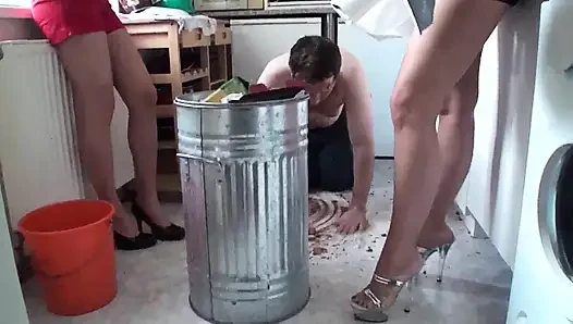 Young ladies playing with their slave in the kitchen