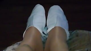 Nylon voeten in de avond