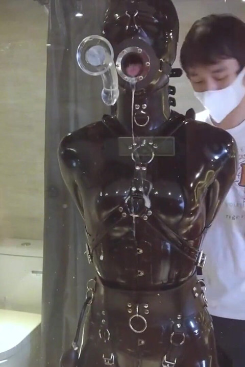 Mz20 - the Girl in Latex Clothing Locked in a Glass Room