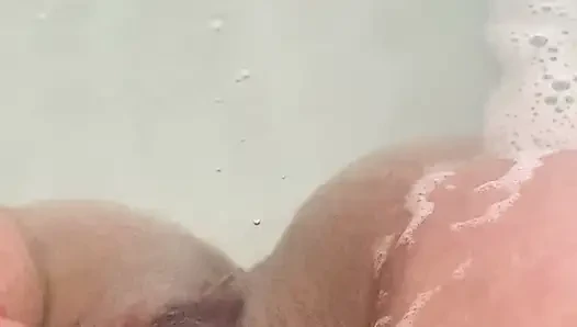 Massaging my pussy in the bath