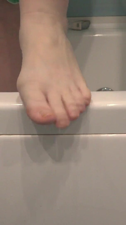 Key moment from "Mature feet in soapy foam. Amateur foot fetish close-up. ASMR."