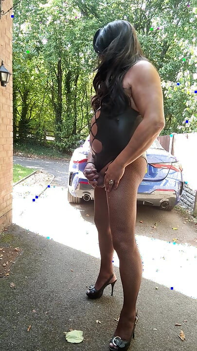 Sexy Crossdresser Kellycd2022's in black pvc bodysuit and fishnet pantyhose