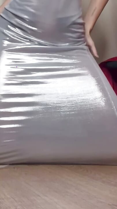 Teasing ass with silver dress 2
