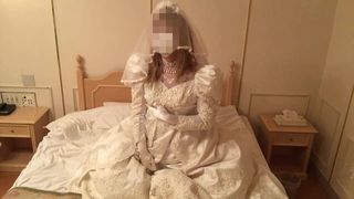 Wedding dress masturbation on bed