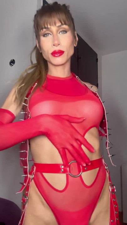 Blonde Trans in Red Latex BDSM Costume Dances | Clip 1
