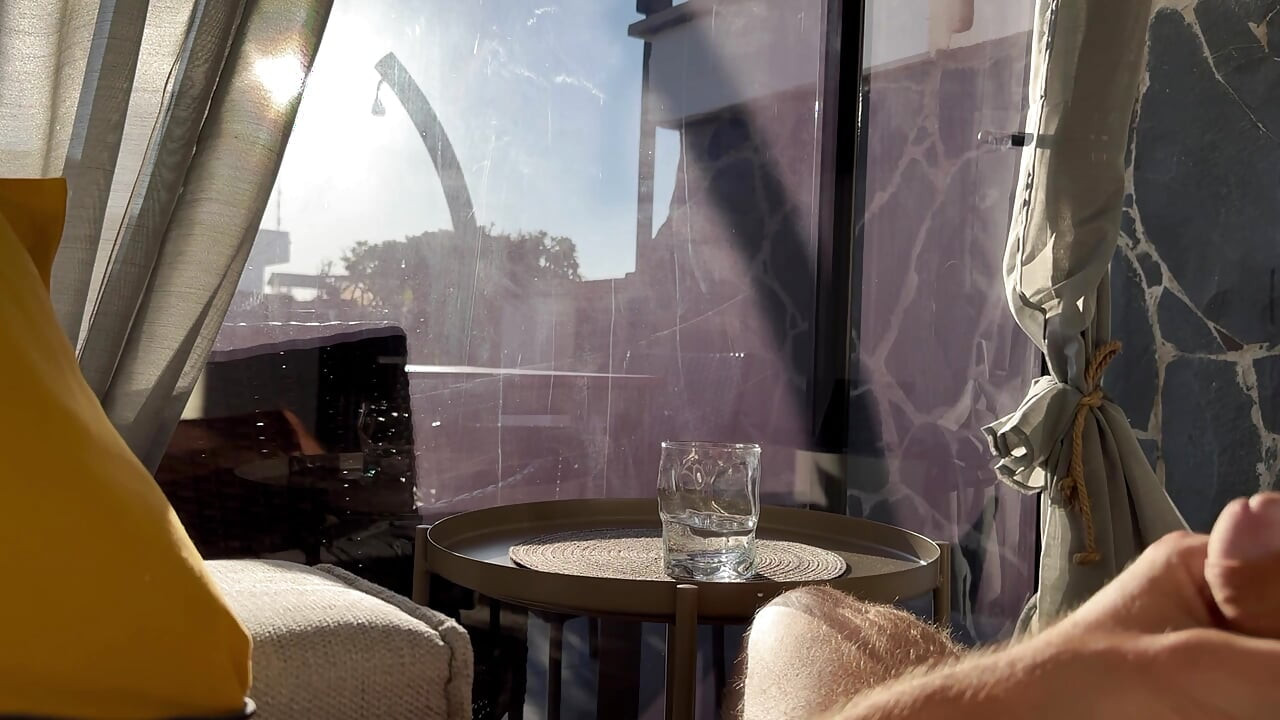 Public cum play in Gran Canaria with my big uncut cock in silk satin boxers in front of the sunny window for neigbors to see