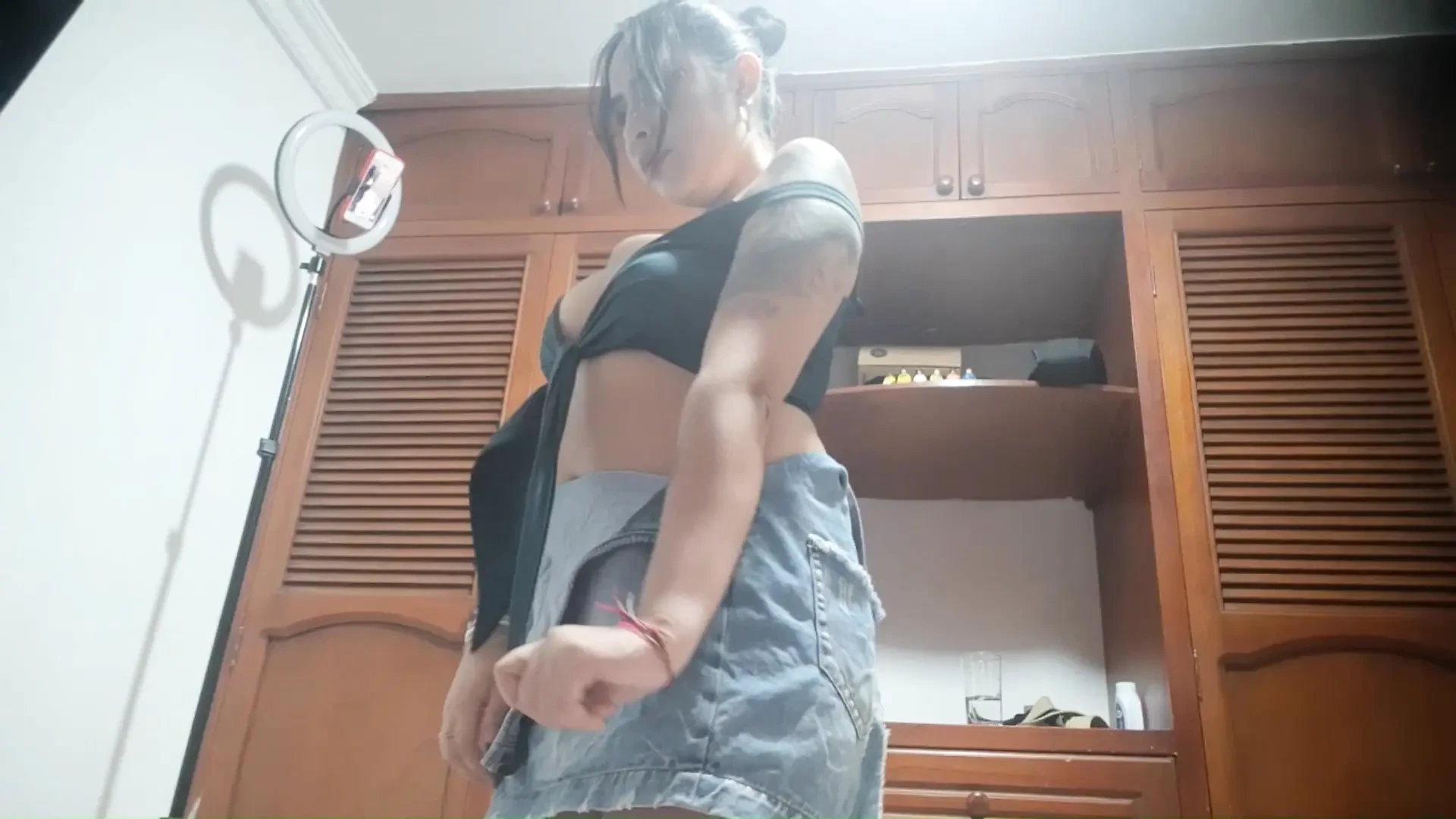 My girlfriend sends me a video of her undressing and showing off her tits