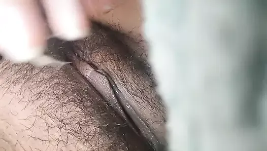 Hairy teen squirting a lot of water
