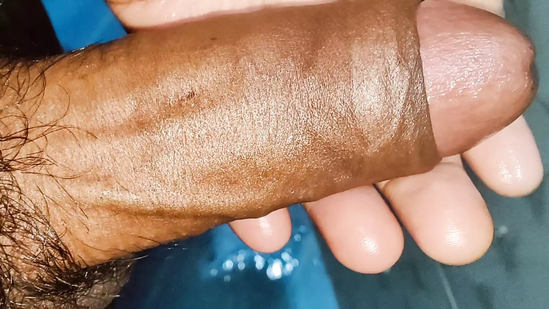 A young man fucking with hand