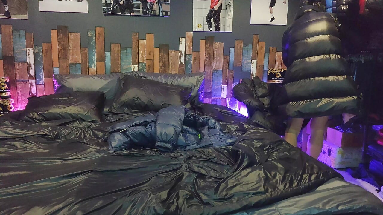 Cock Rubbing Down Jacket on Shiny Nylon Bed