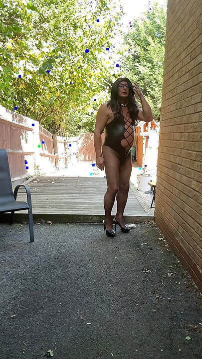 Sexy Crossdresser Kellycd2022's in black pvc bodysuit and fishnet pantyhose