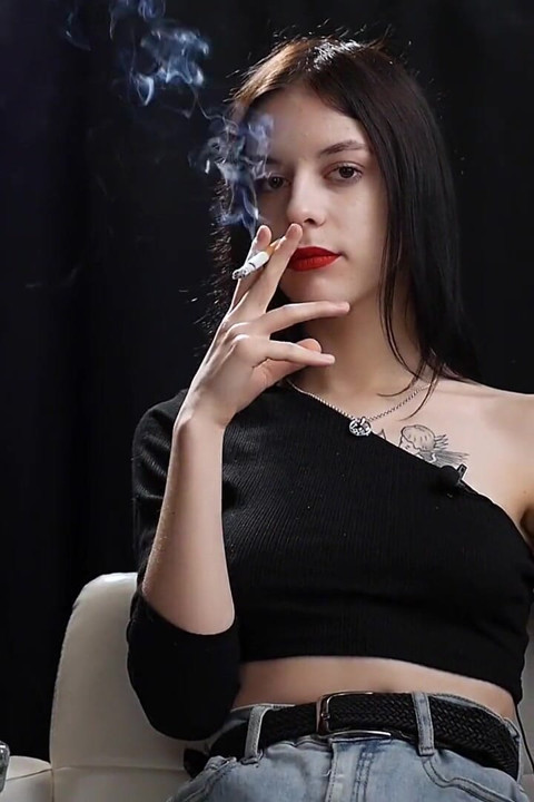 Slim Chick Is Smoking Two Reds